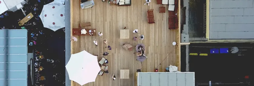 a helicopter view of a big, wooden rooftop in the Bochum Bermuda triangle.